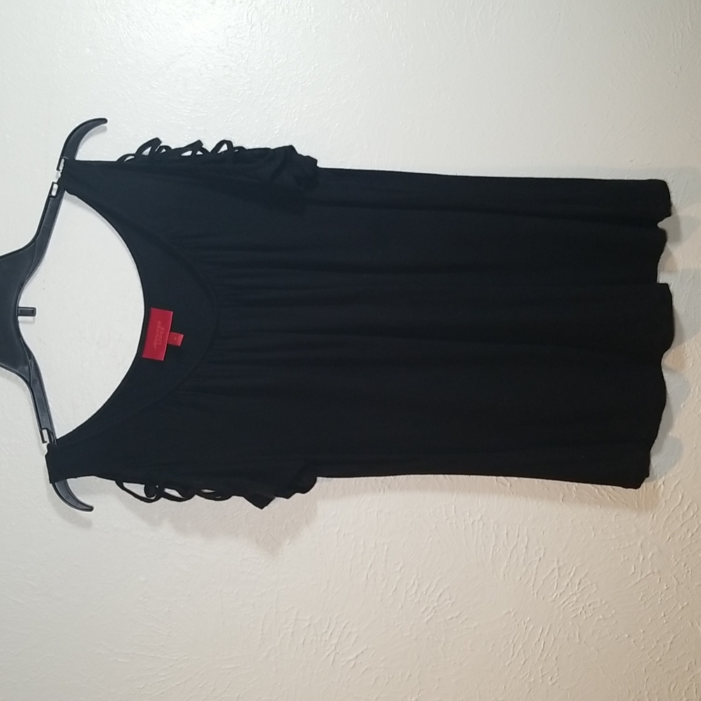 Jennifer Lopez Black Top Size M.  Sleeves off the Shoulder with Braided top.